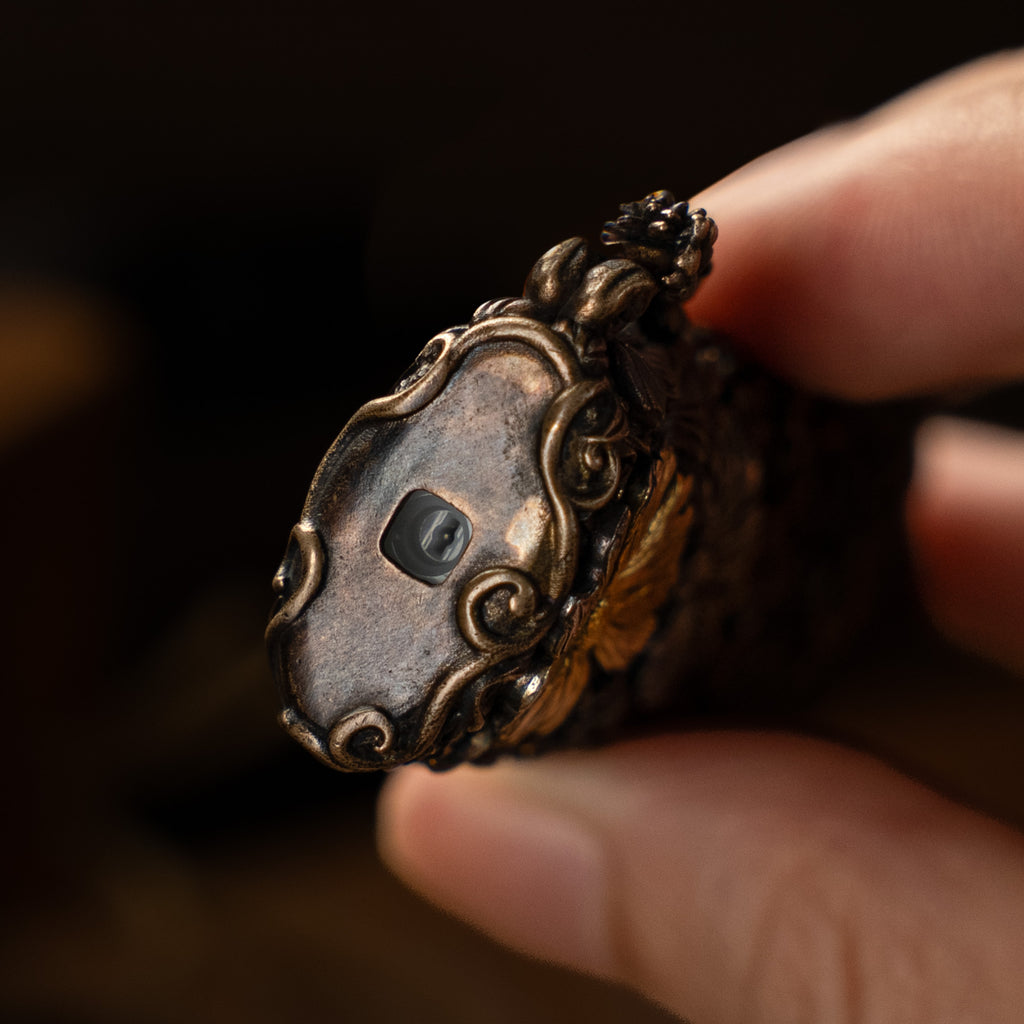 JASON WanHua bronze lighter case bottom detail with handcrafted metal finish