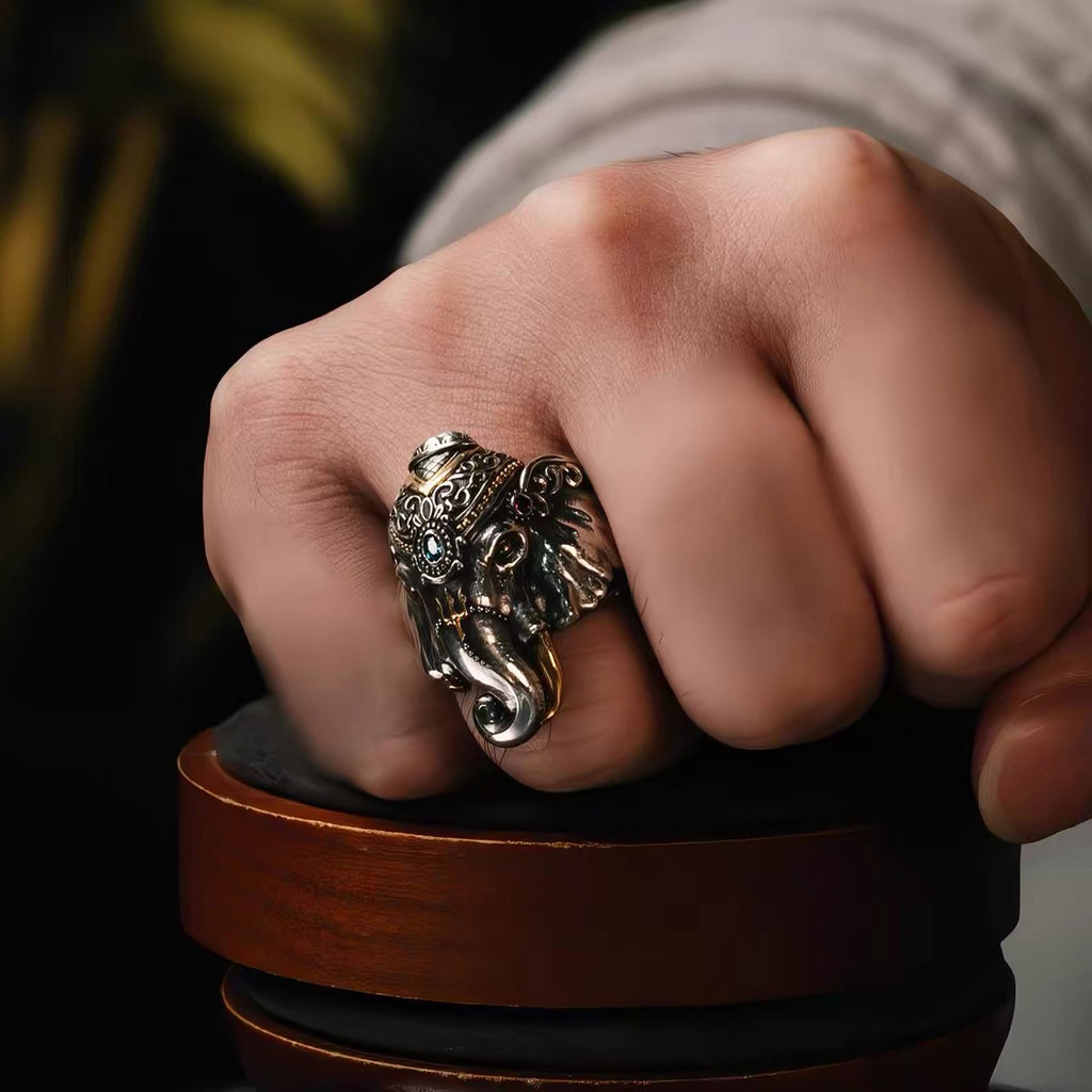Vintage silver and gold statement ring worn on hand with artisan design